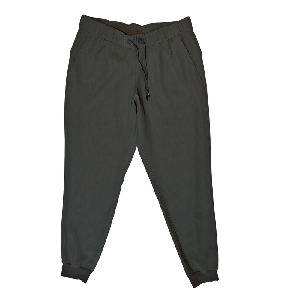 Lululemon On the Fly Jogger Women 10 Green Woven Tapered Pant Drawstring Pocket
